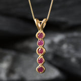 Elegant 18k Gold Vermeil Ruby Pendant, featuring a round natural red ruby, perfect for birthdays and special occasions.