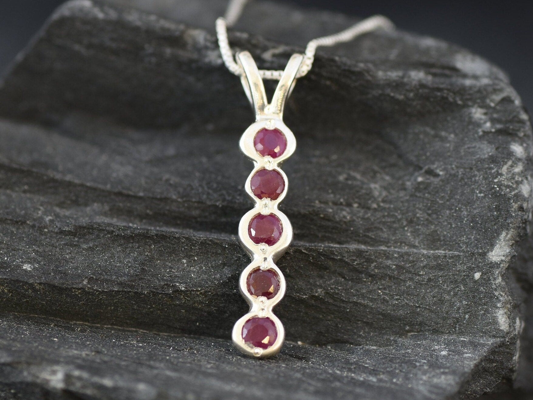 Elegant 925 Sterling Silver Ruby Pendant featuring a round natural red ruby, perfect for everyday wear and special occasions.