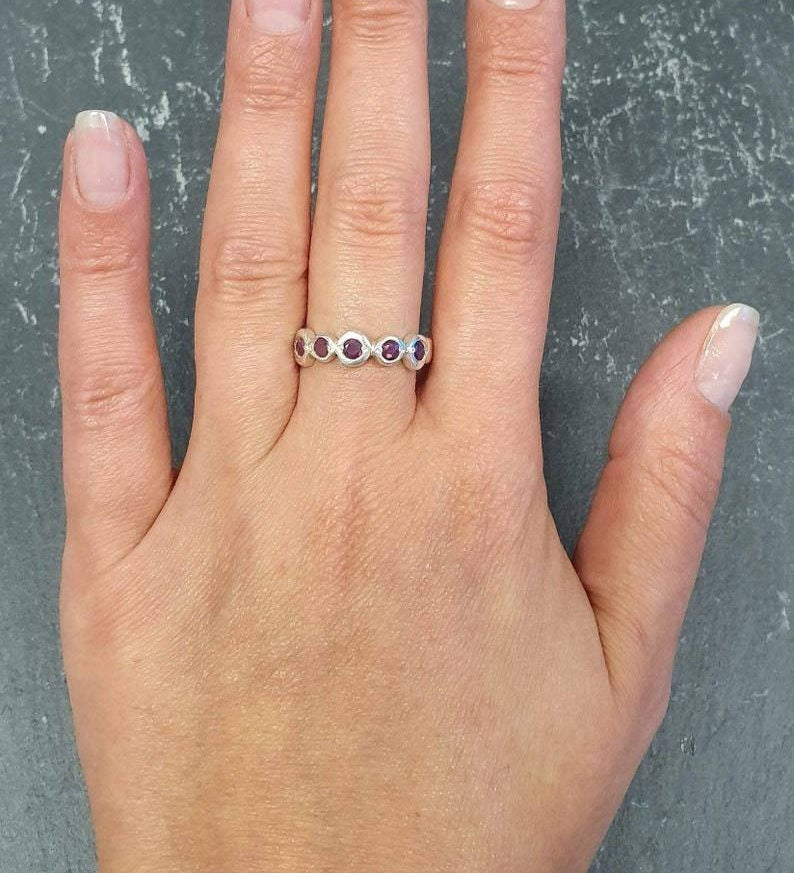 Elegant 925 Sterling Silver ring featuring a round natural red ruby, perfect for everyday wear and special occasions.