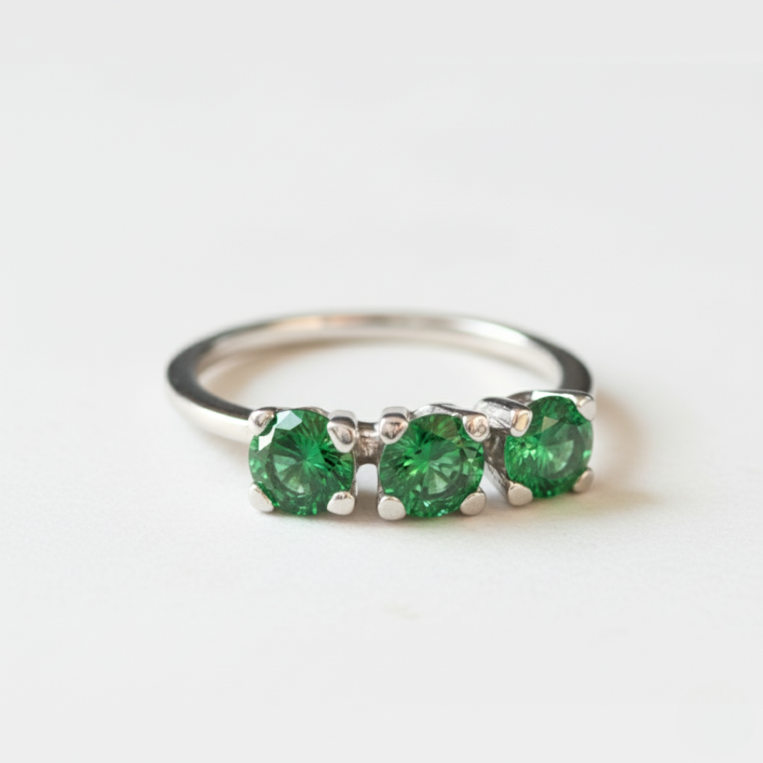 Stunning Created Emerald Ring in 925 Sterling Silver, showcasing a Three-Stone setting—ideal for special occasions and gifts.