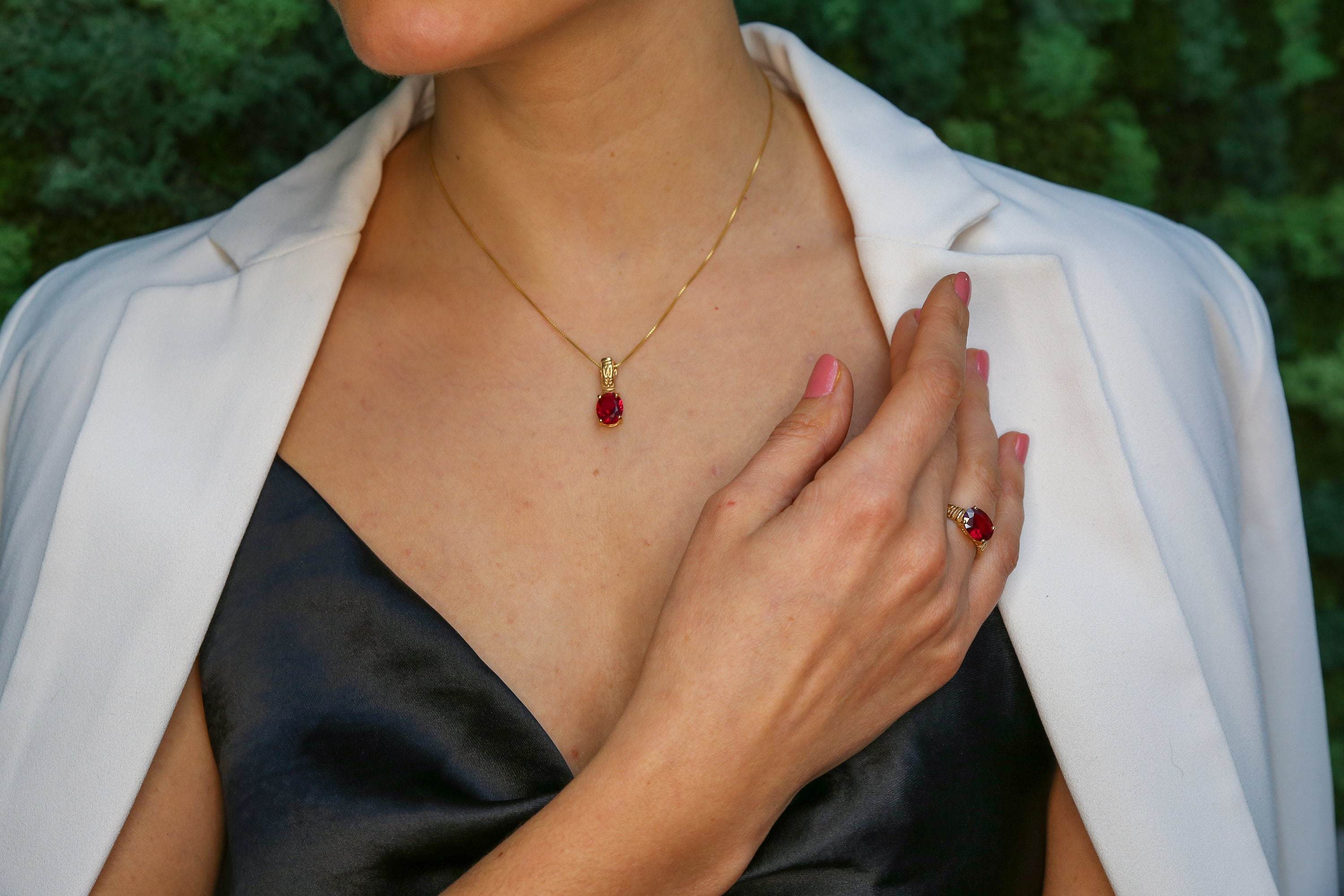 Elegant Ruby Pendant in 18k Gold Vermeil, showcasing a vibrant Oval Created Red Ruby, perfect for July birthdays and special occasions.