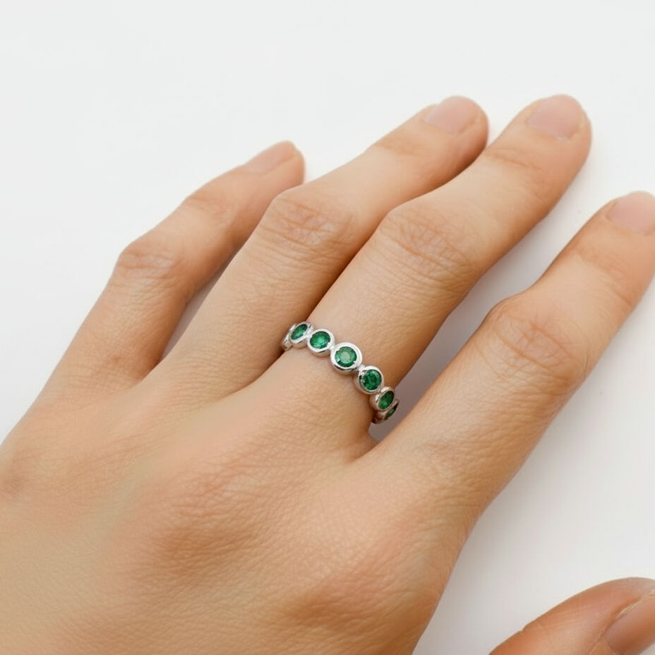 Elegant 925 Sterling Silver ring featuring a Round Created Green Emerald, perfect for May birthdays and special occasions.