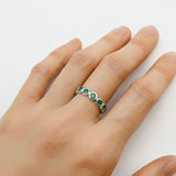 Elegant 925 Sterling Silver ring featuring a Round Created Green Emerald, perfect for May birthdays and special occasions.