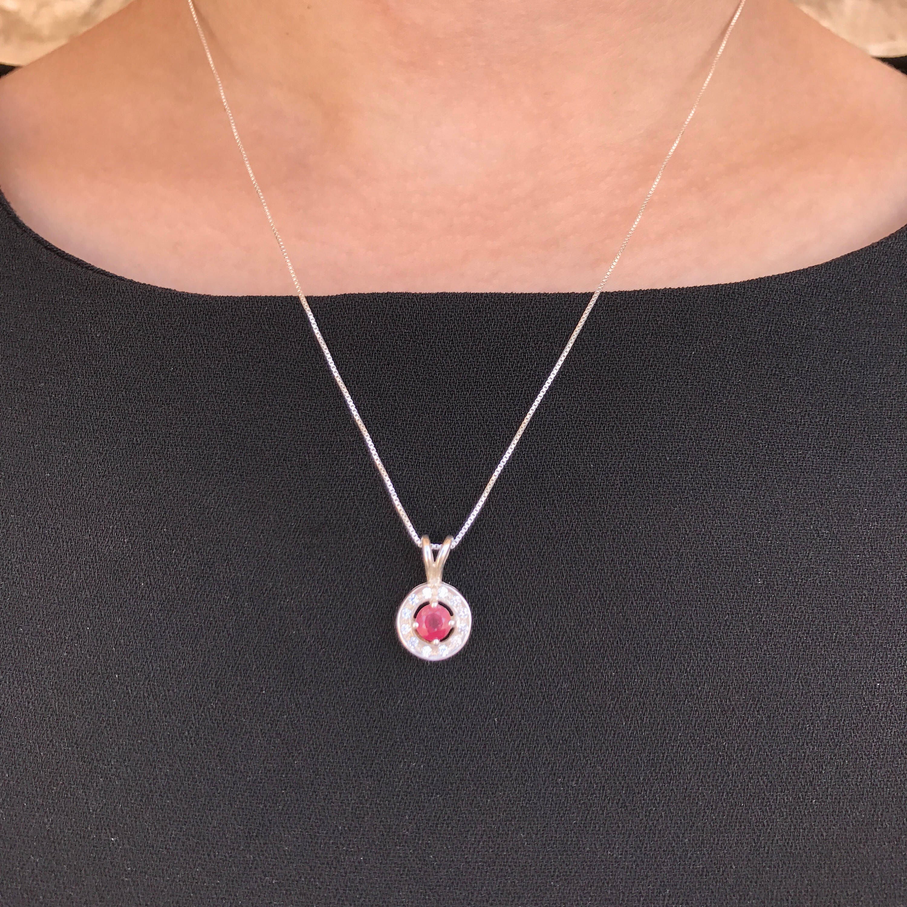 Elegant 925 Sterling Silver pendant featuring a Round Natural Red Ruby, perfect for July birthdays and special occasions.