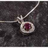 Natural Ruby Pendant made in 925 Sterling Silver with Round Natural Red Ruby in Halo setting, July Birthstone gift idea, symbolizes nobility, purity, and passion, ideal for everyday wear and perfect for birthday gifting and special occasions.