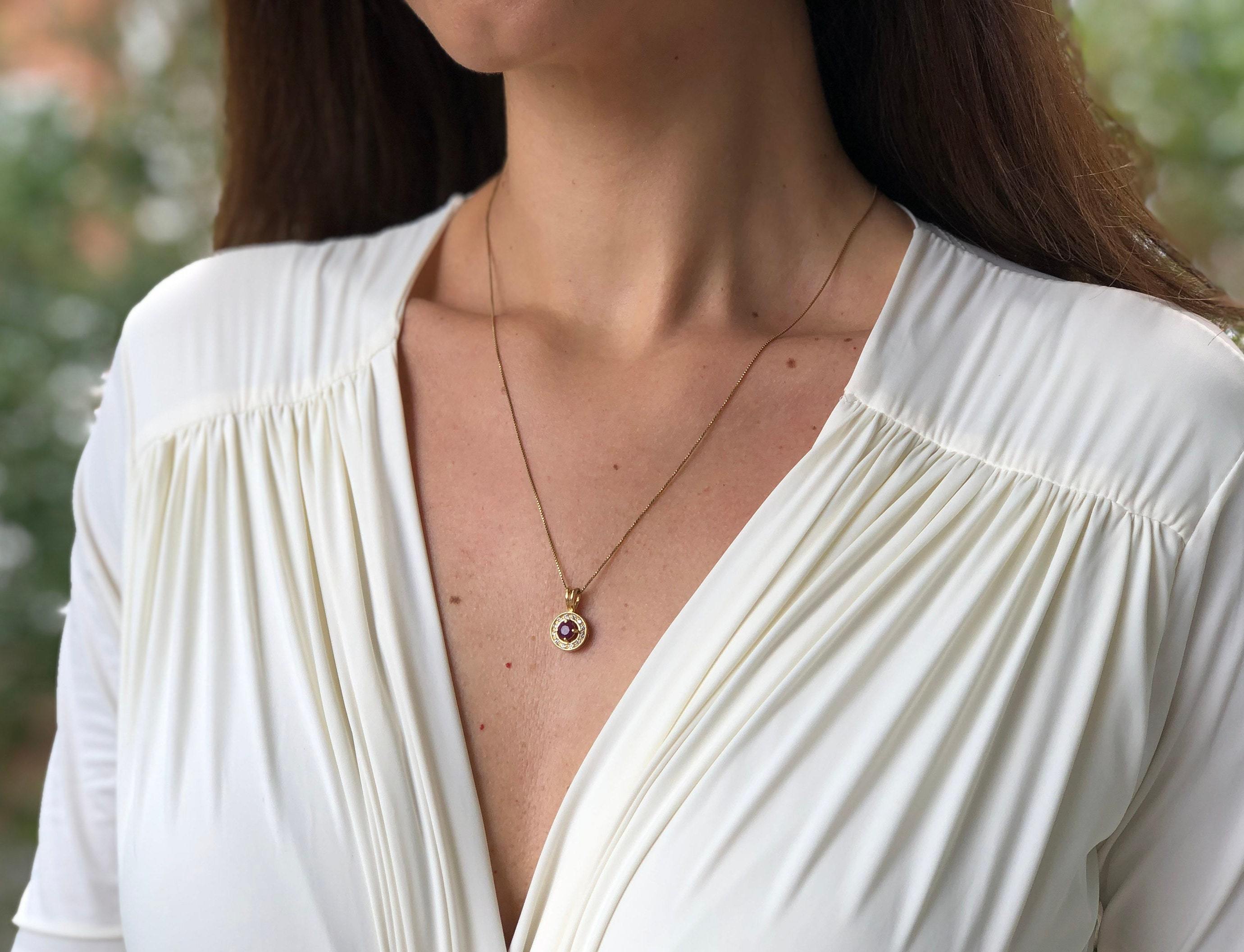 Elegant 18k Gold Vermeil Ruby Pendant with Halo setting, perfect for birthdays and special occasions. Symbolizes nobility and passion.