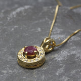 Natural Ruby Pendant made in 18k Gold Vermeil with Round Natural Red Ruby in Halo setting, July Birthstone gift idea, symbolizes nobility, purity, and passion, ideal for everyday wear and perfect for birthday gifting and special occasions.