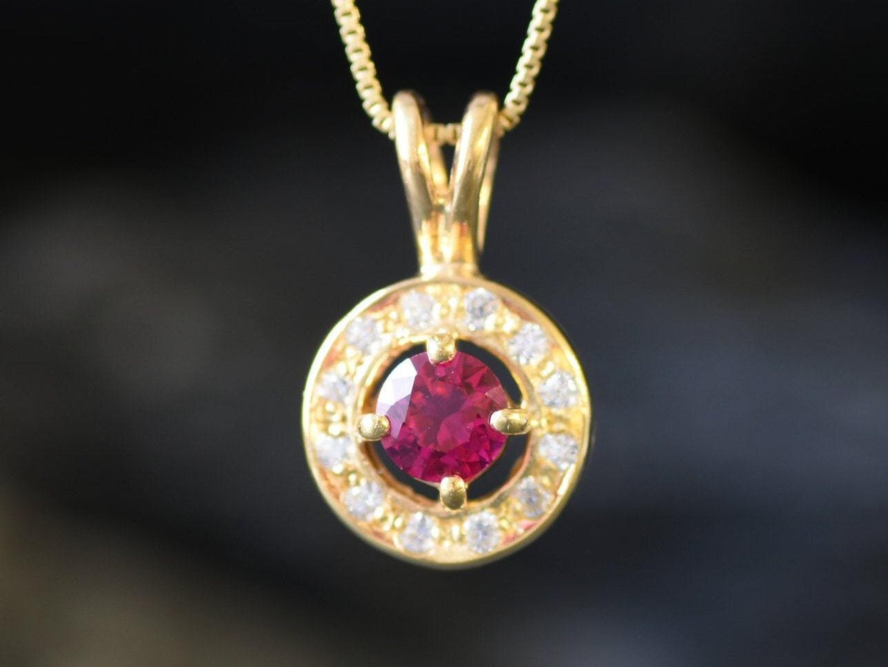 Elegant 18k Gold Vermeil Ruby Pendant featuring a Round Created Red Ruby, perfect for birthdays and special occasions.