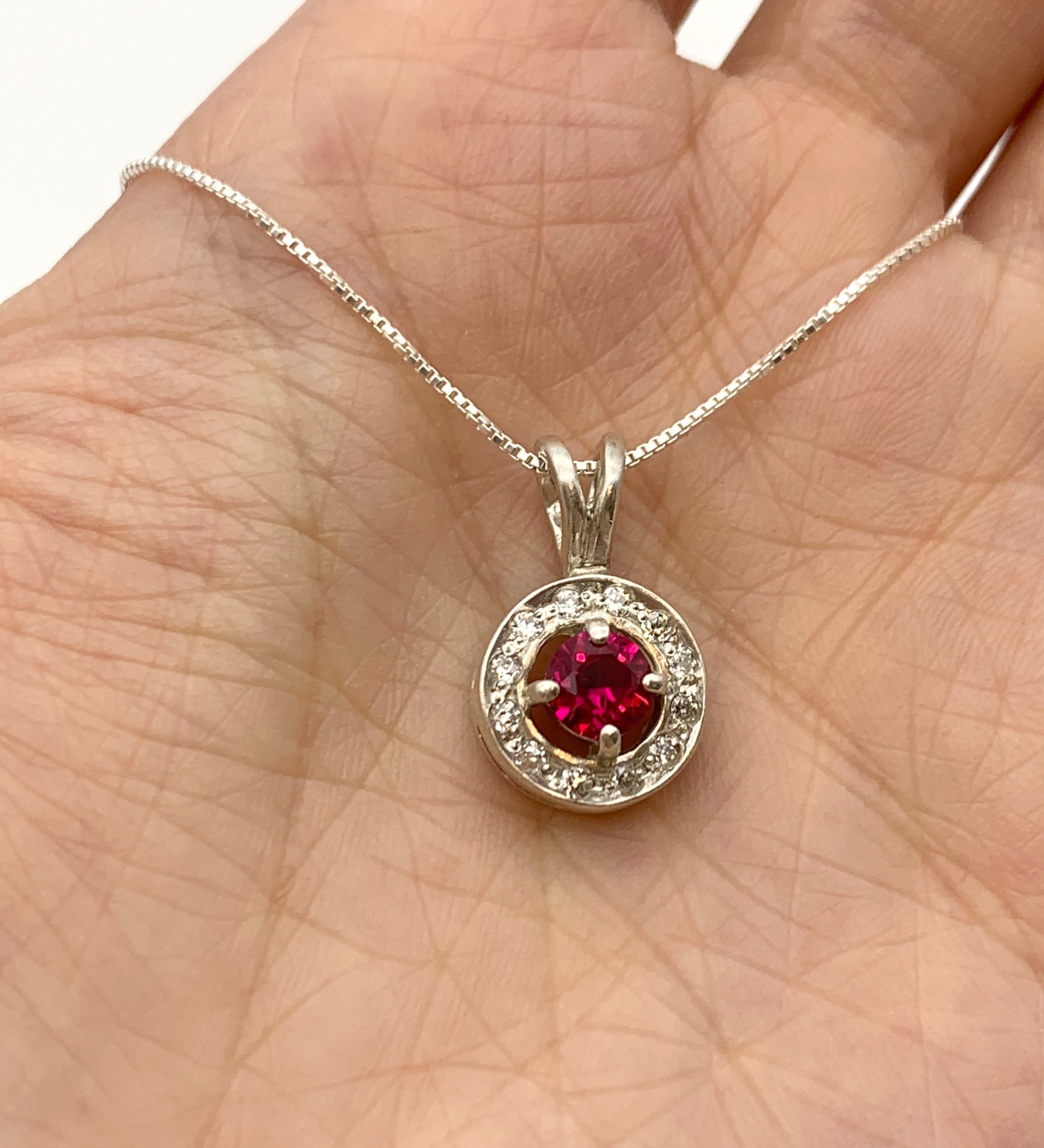 Elegant Ruby Pendant in 925 Sterling Silver with Red Ruby in Halo setting—perfect for July birthdays and special occasions.