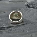 Dazzling 925 Sterling Silver halo ring with a Round Created Green Emerald, a meaningful May birthstone gift for loved ones.