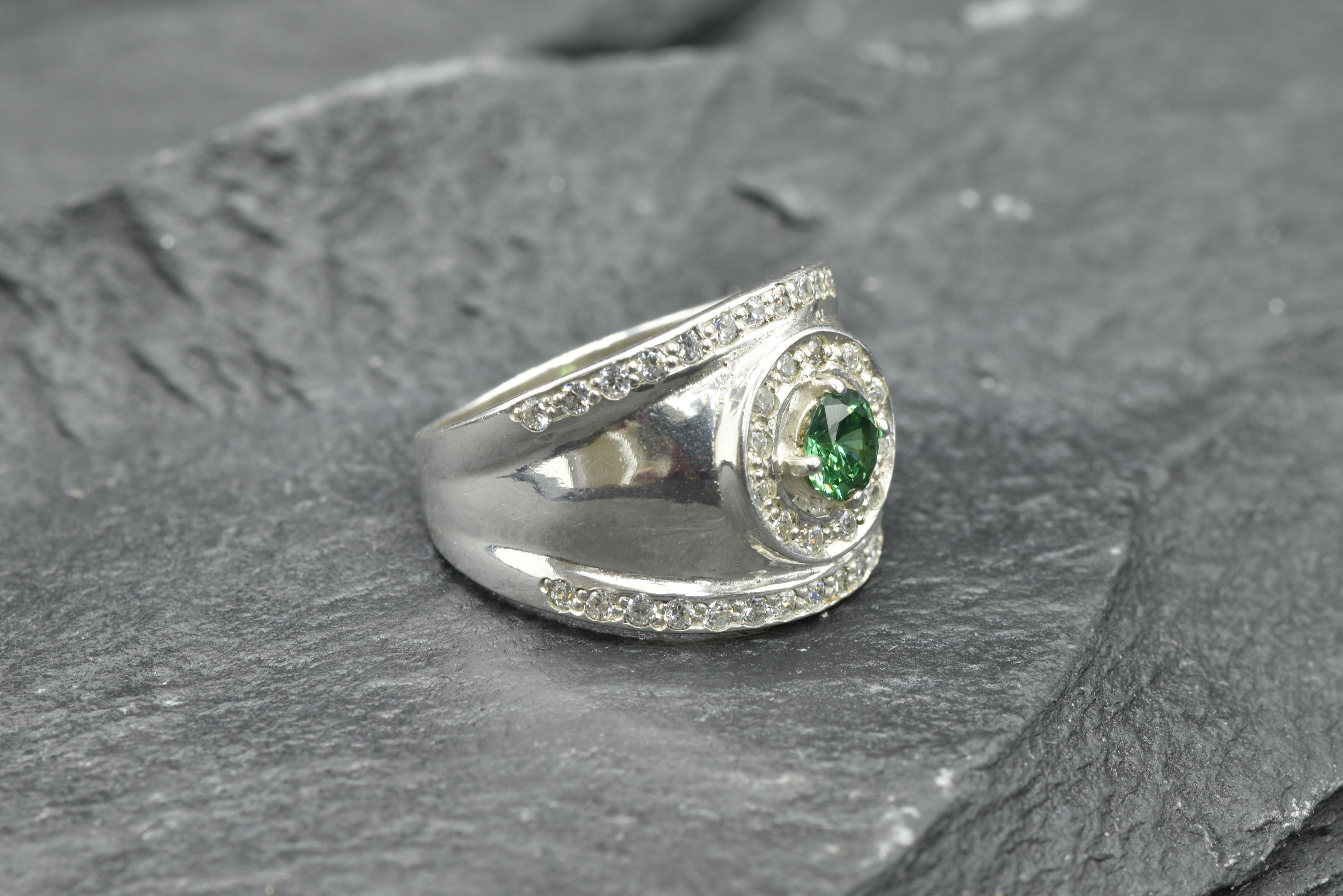 Stunning 925 Sterling Silver ring with a Round Created Green Emerald, perfect for daily wear and May birthstone celebrations.