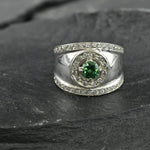 Beautifully crafted 925 Sterling Silver ring showcasing a Round Created Green Emerald, ideal for special occasions and May birthdays.