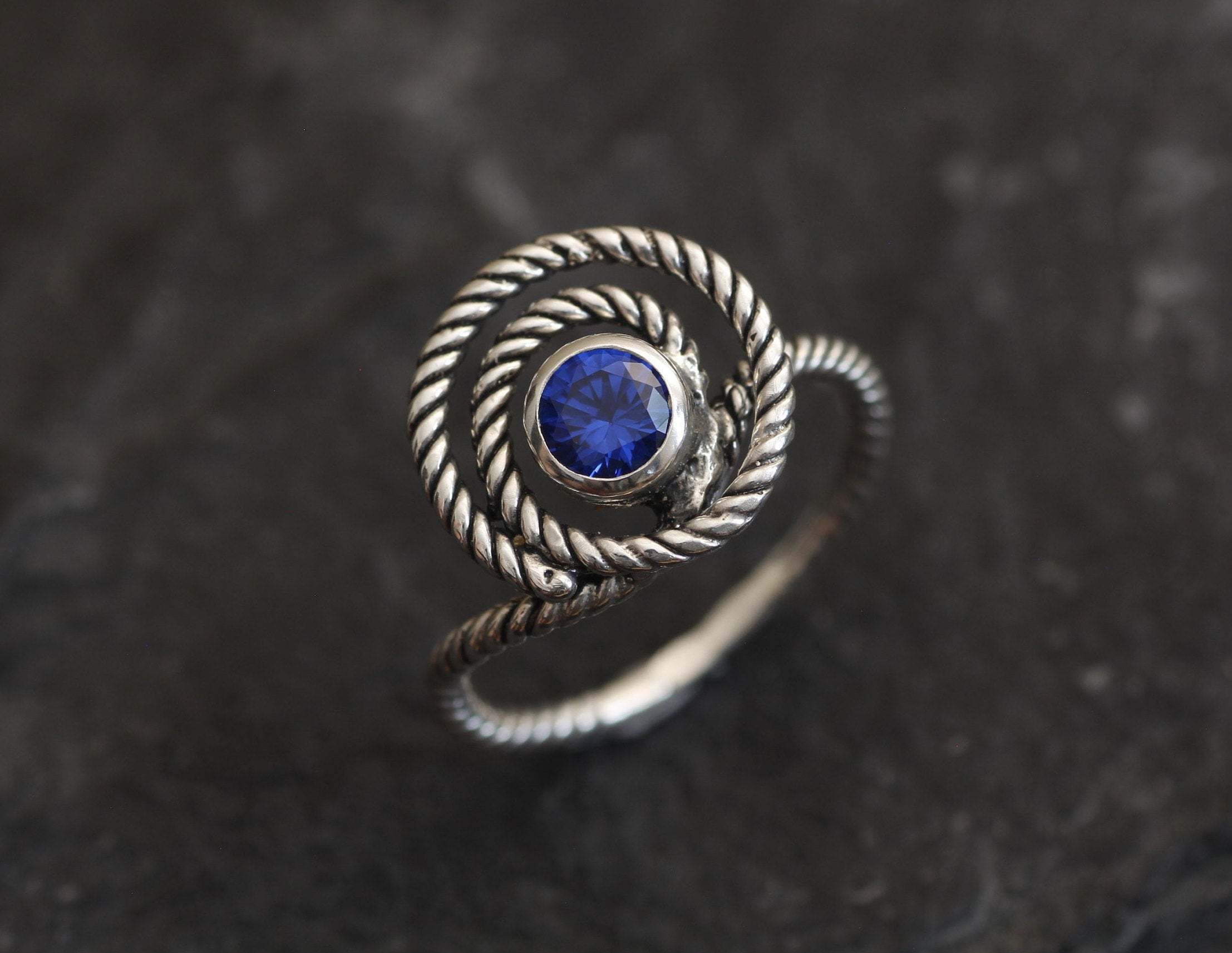 Created Sapphire Ring made in 925 Sterling Silver with Round Created Blue Sapphire in Bezel setting, September Birthstone gift idea, symbolizes sincerity, truth, and faithfulness, ideal for everyday wear and perfect for birthday gifting and special occasions.