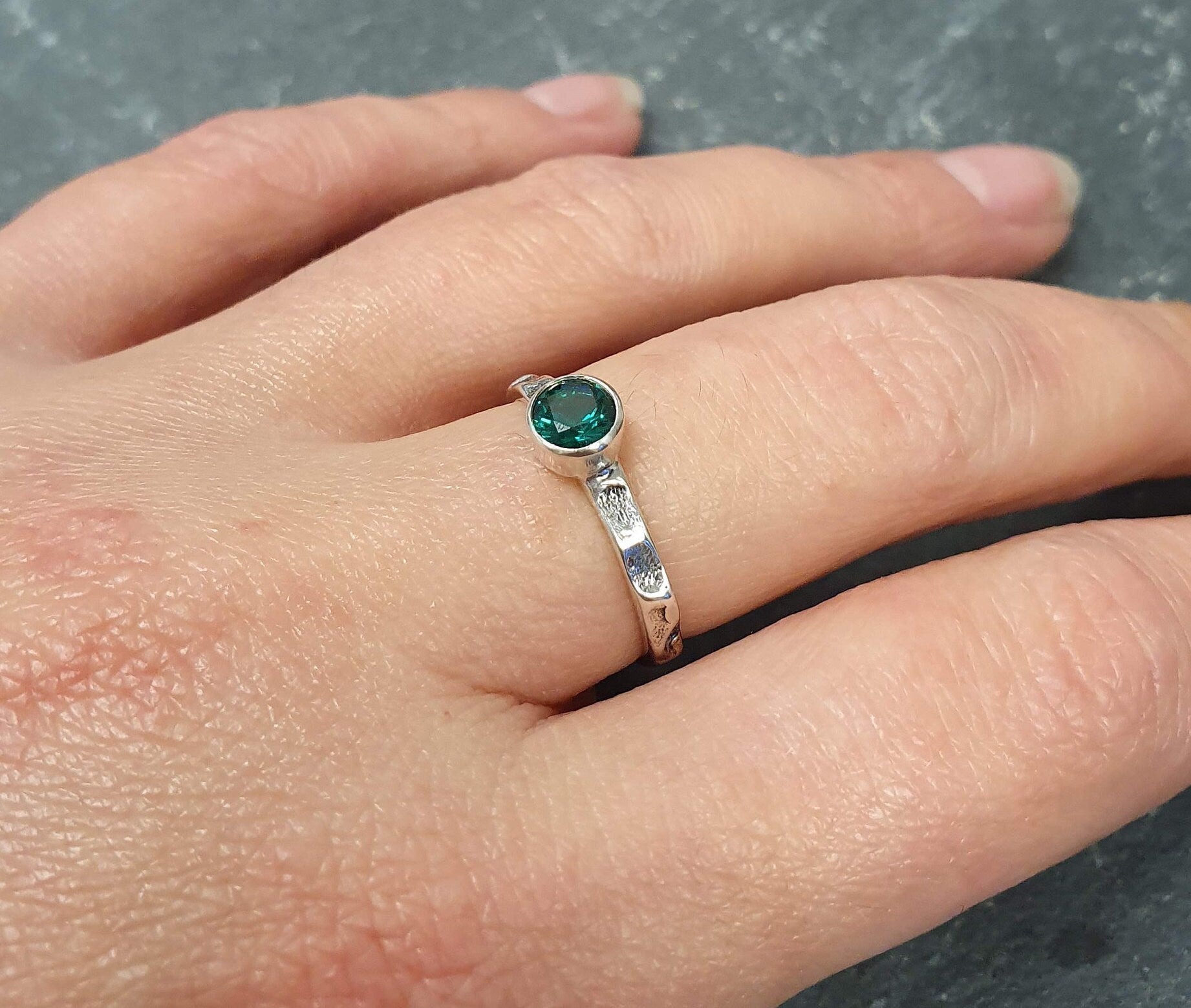 Stylish 925 Sterling Silver Ring featuring Round Created Green Emerald in Bezel setting, perfect for May birthdays and special occasions.