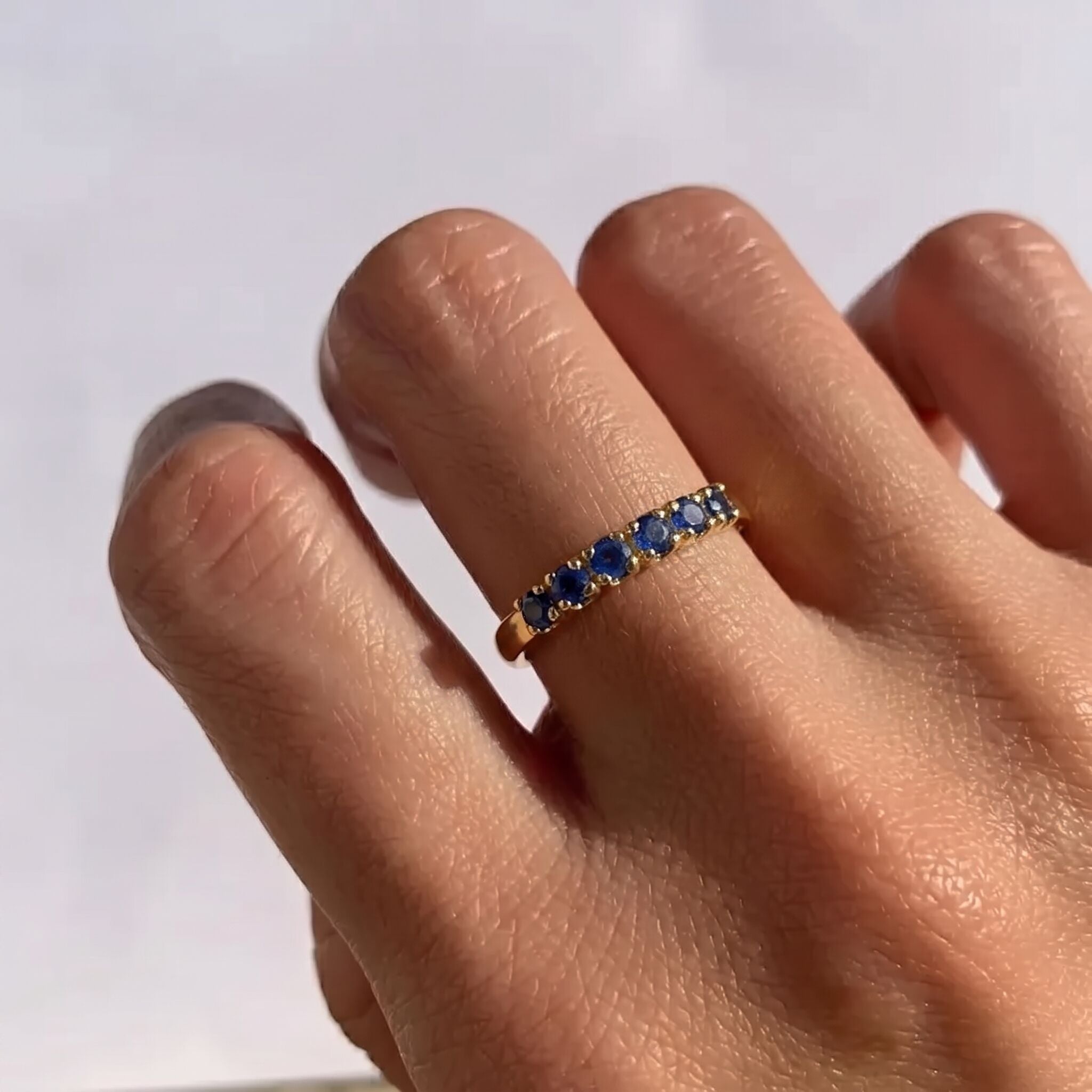 18k Gold Vermeil Natural Sapphire Ring featuring a round blue sapphire in a channel-set design, perfect for birthdays and special occasions.