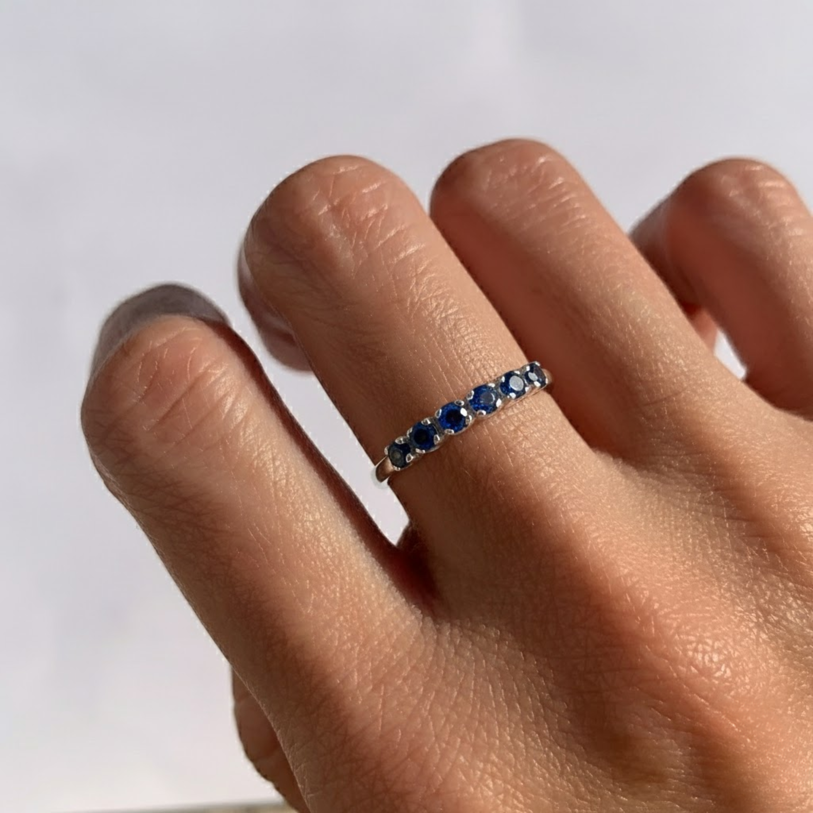 Natural Blue Sapphire Ring in 925 Sterling Silver, Channel-Set, symbolizes sincerity and faithfulness, perfect for gifts.