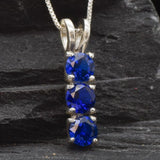 Created Sapphire Pendant made in 925 Sterling Silver with Round Created Blue Sapphire in Three-Stone setting, September Birthstone gift idea, symbolizes sincerity, truth, and faithfulness, ideal for everyday wear and perfect for birthday gifting and special occasions.