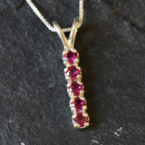 Created Ruby Pendant made in 925 Sterling Silver with Round Created Red Ruby in Channel-Set setting, July Birthstone gift idea, symbolizes nobility, purity, and passion, ideal for everyday wear and perfect for birthday gifting and special occasions.