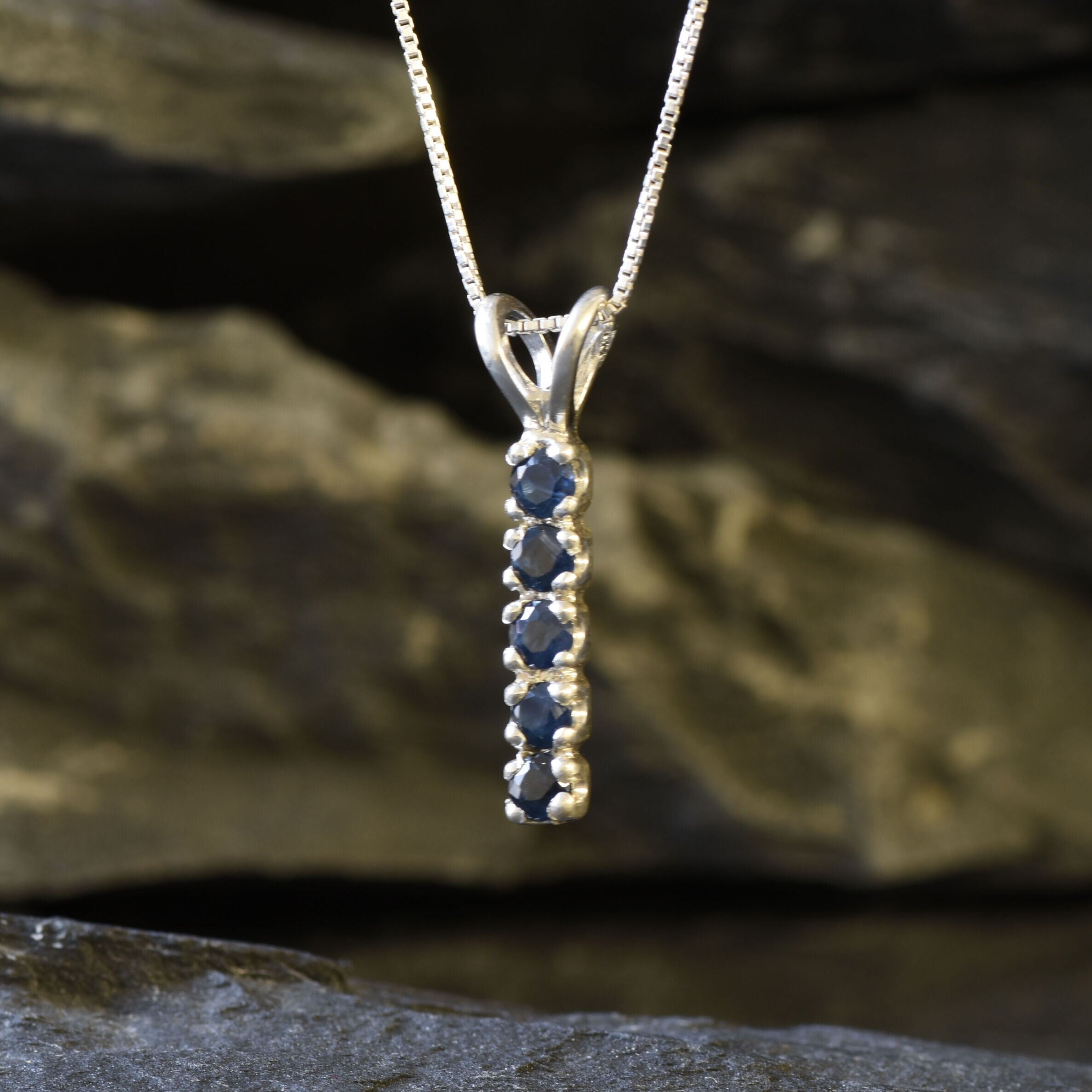 Created Sapphire Pendant made in 925 Sterling Silver with Round Created Blue Sapphire in Channel-Set setting, September Birthstone gift idea, symbolizes sincerity, truth, and faithfulness, ideal for everyday wear and perfect for birthday gifting and special occasions.