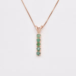 Natural Emerald Pendant made in Rose Gold Vermeil with Round Natural Green Emerald in Channel-Set setting, May Birthstone gift idea, symbolizes growth, harmony, and deep emotional healing, ideal for everyday wear and perfect for birthday gifting and special occasions.