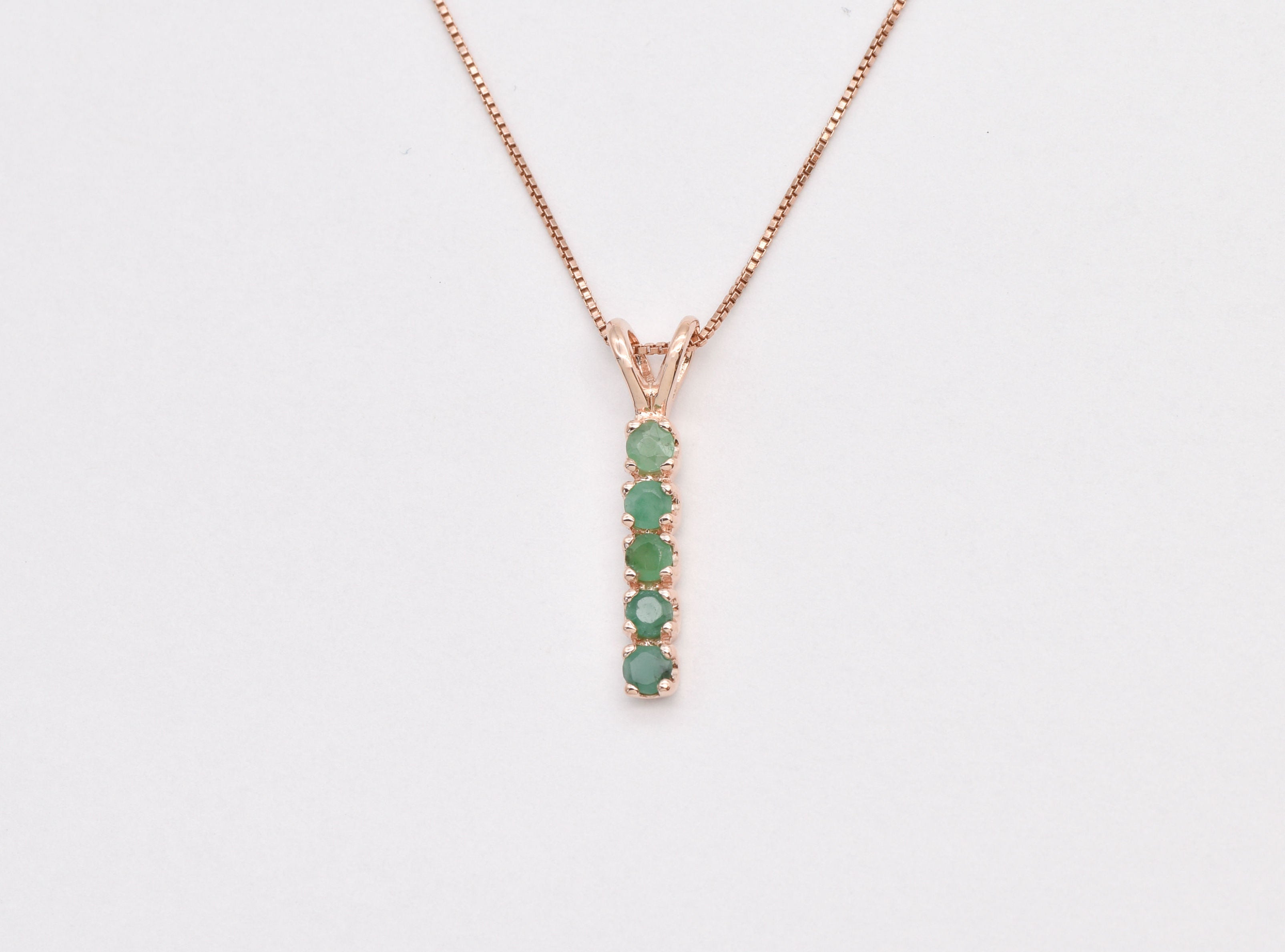 Natural Emerald Pendant made in Rose Gold Vermeil with Round Natural Green Emerald in Channel-Set setting, May Birthstone gift idea, symbolizes growth, harmony, and deep emotional healing, ideal for everyday wear and perfect for birthday gifting and special occasions.