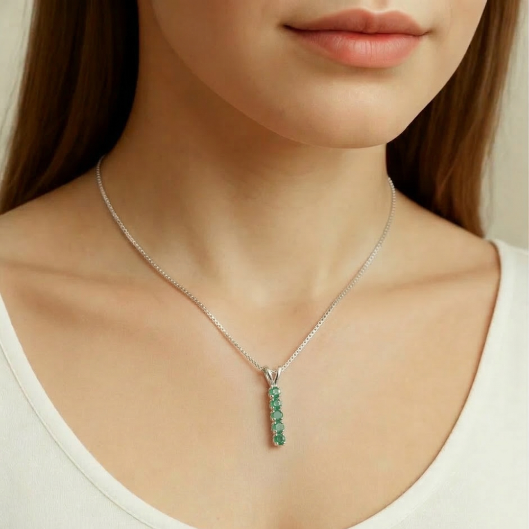 Elegant 925 Sterling Silver Natural Emerald Pendant with round channel-set emerald, symbolizing growth and healing. Perfect gift!