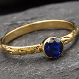 Beautiful 18k Gold Vermeil ring featuring a bezel-set Blue Sapphire; a meaningful September birthstone gift for any occasion.
