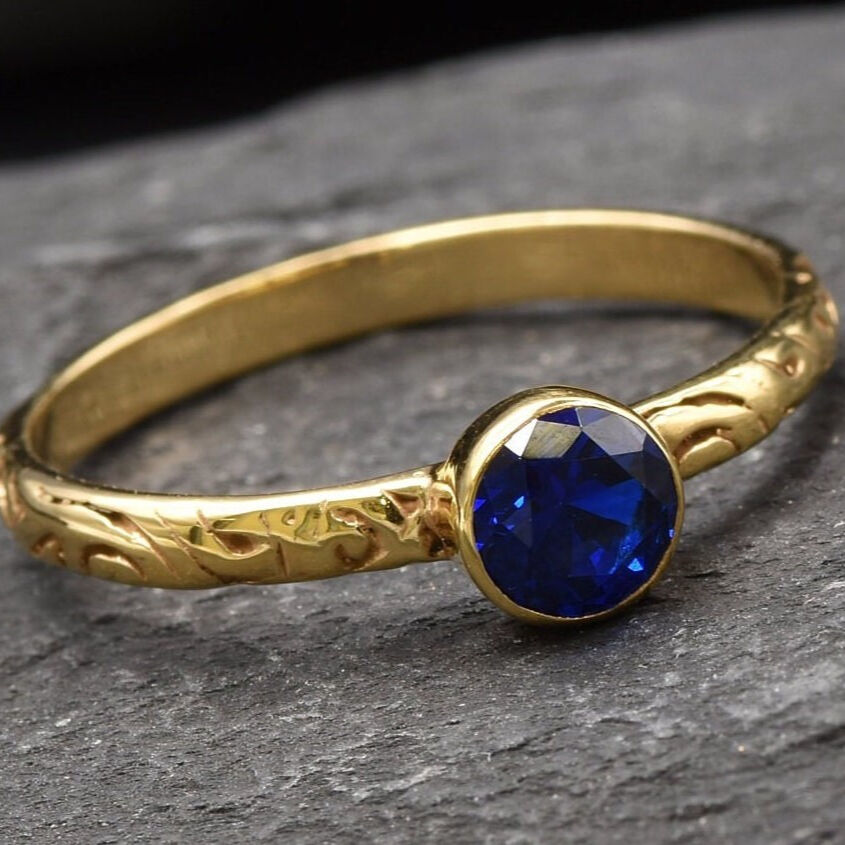Beautiful 18k Gold Vermeil ring featuring a bezel-set Blue Sapphire; a meaningful September birthstone gift for any occasion.