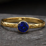 Stunning 18k Gold Vermeil Ring adorned with a bezel-set Created Blue Sapphire; ideal September gift for cherished moments.