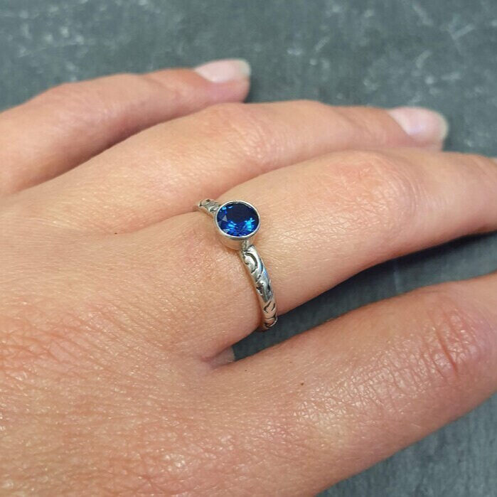 18k Gold Vermeil Sapphire Ring with Bezel Set Blue Sapphire; September Birthstone, symbolizing sincerity and faithfulness.