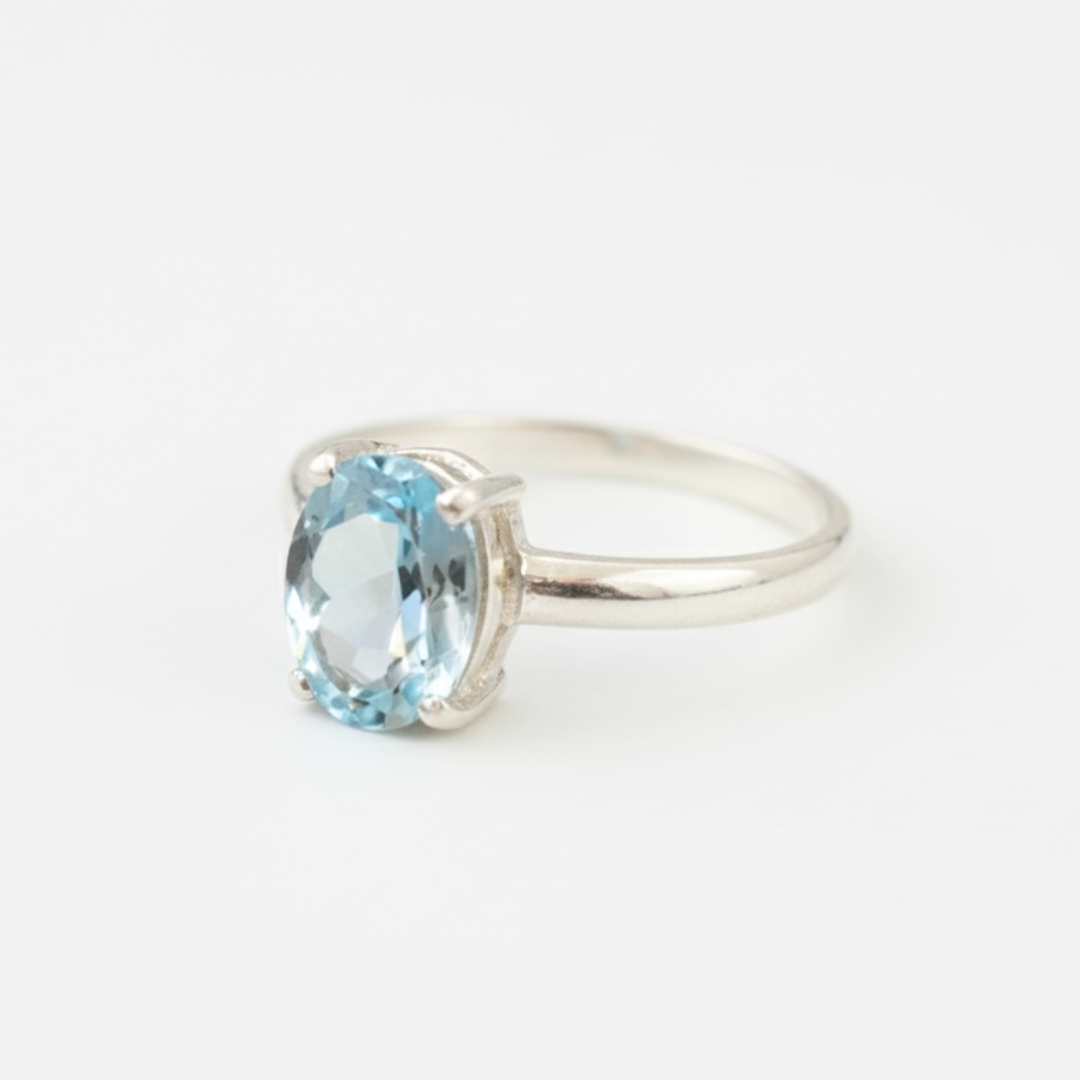 Radiant Blue Topaz Solitaire Ring - Artfully set in 925 Sterling Silver, perfect for any occasion or daily elegance.