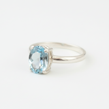 Radiant Blue Topaz Solitaire Ring - Artfully set in 925 Sterling Silver, perfect for any occasion or daily elegance.