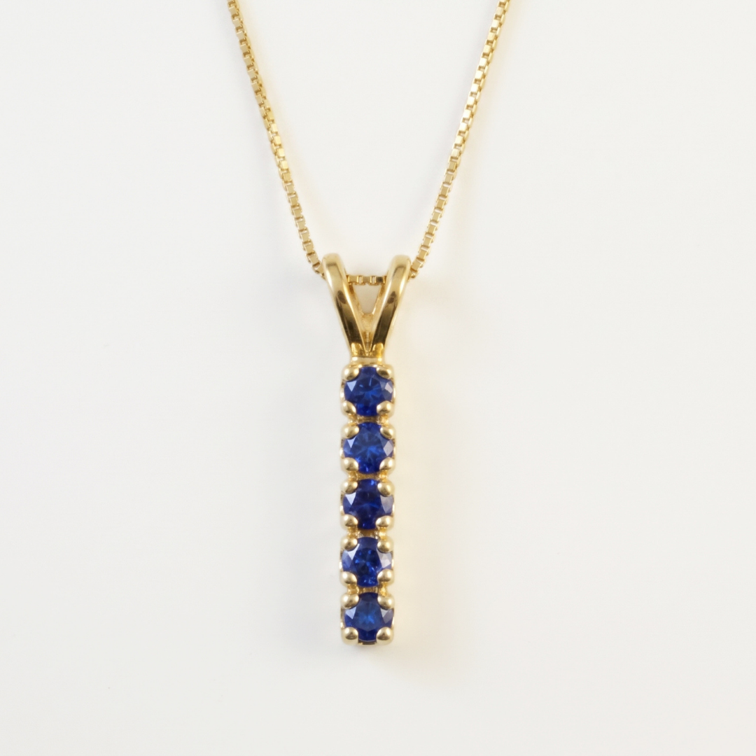 Created Sapphire Pendant made in 18k Gold Vermeil with Round Created Blue Sapphire in Channel-Set setting, September Birthstone gift idea, symbolizes sincerity, truth, and faithfulness, ideal for everyday wear and perfect for birthday gifting and special occasions.