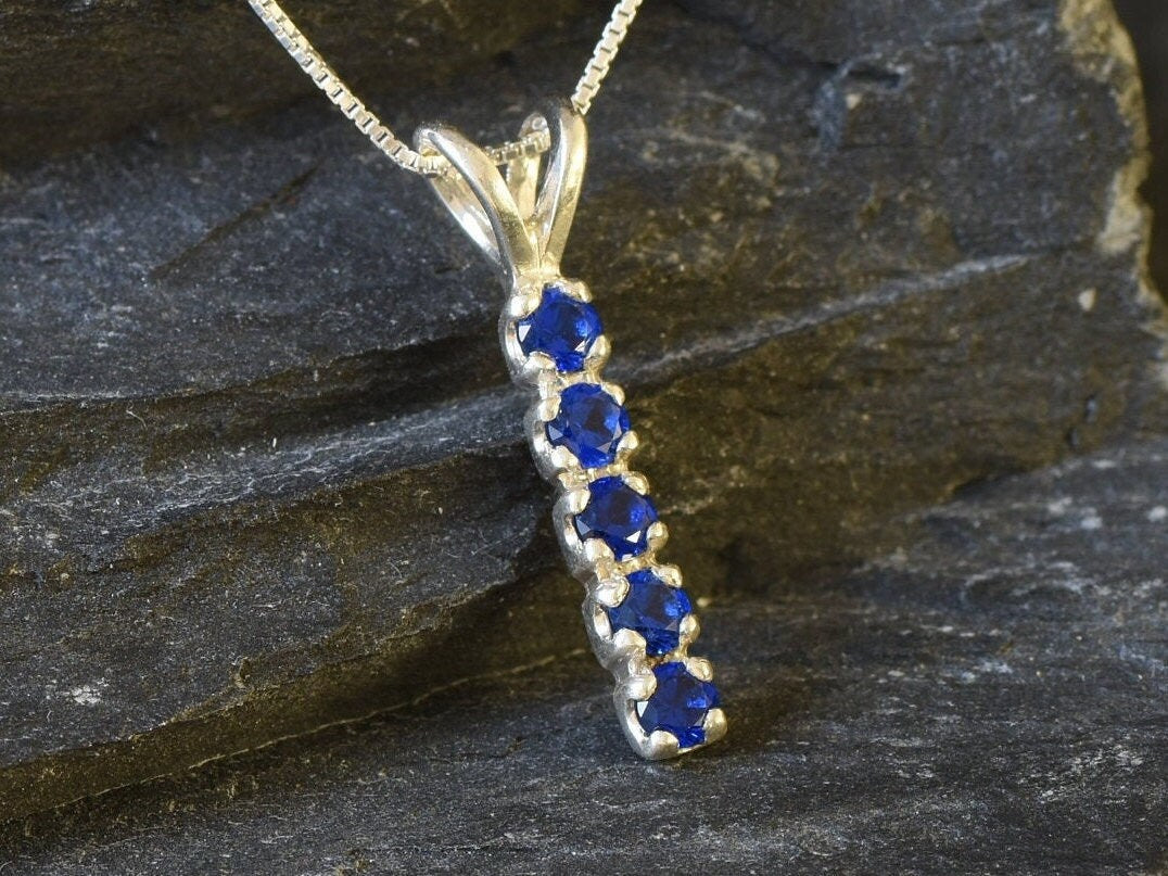 Created Sapphire Pendant in 925 Sterling Silver, showcasing Round Blue Sapphire, perfect for gifts and everyday wear.