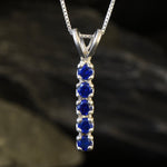 Created Sapphire Pendant made in 925 Sterling Silver with Round Created Blue Sapphire in Channel-Set setting, September Birthstone gift idea, symbolizes sincerity, truth, and faithfulness, ideal for everyday wear and perfect for birthday gifting and special occasions.