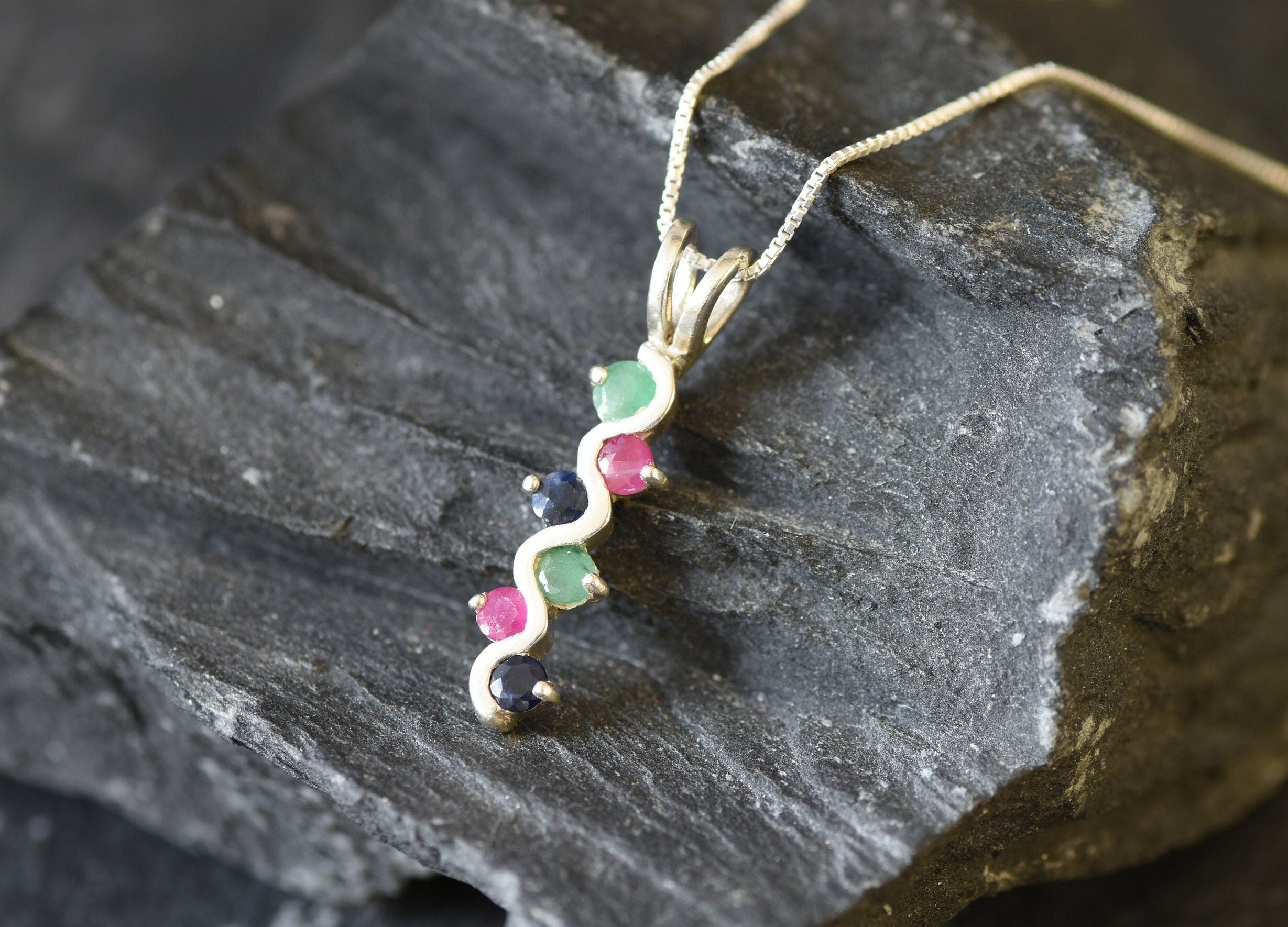 Elegant 925 Sterling Silver pendant featuring a round Natural Blue Sapphire, a meaningful September birthstone gift.