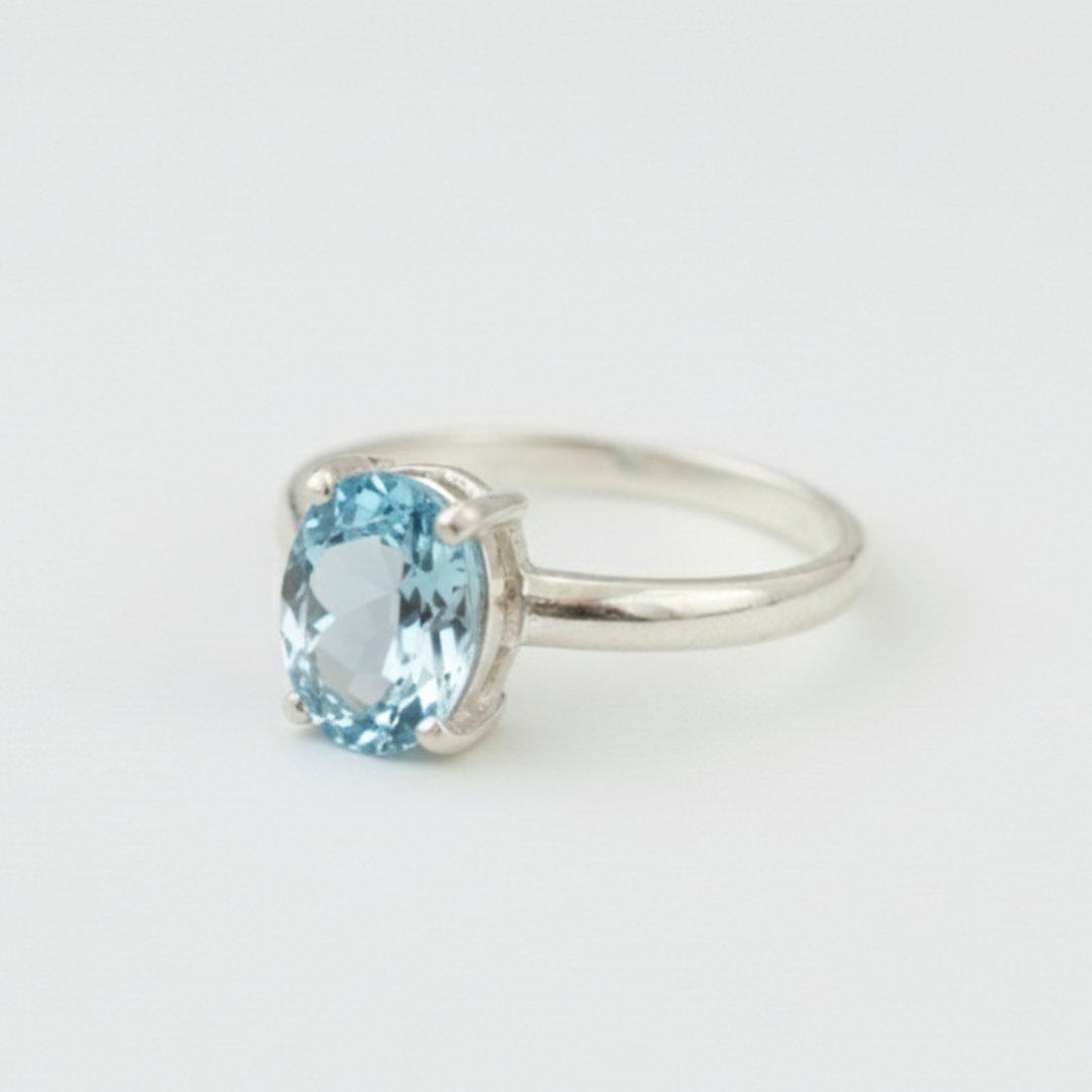 Beautiful 925 Sterling Silver ring featuring an oval Created Aquamarine, a perfect gift for those born in March and beyond.