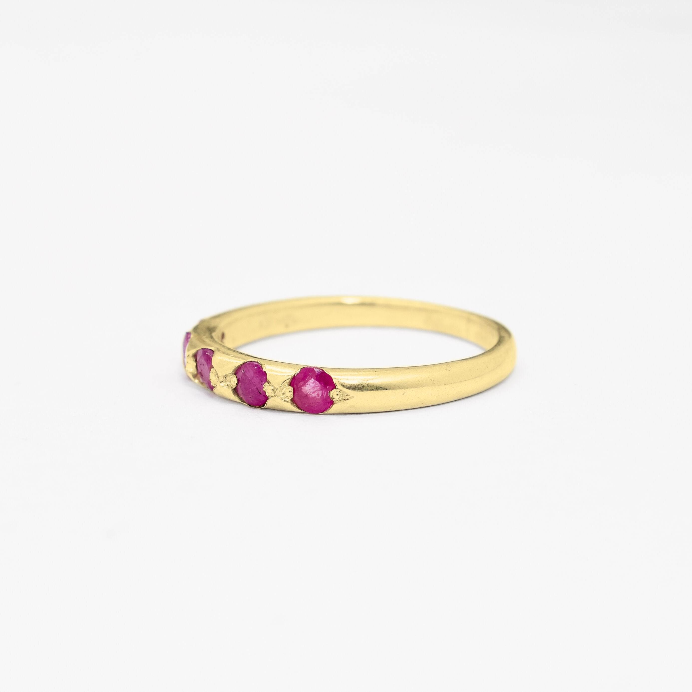 Beautiful 18k Gold Vermeil ring featuring a rich Round Natural Ruby in a luxurious channel-set design, perfect for gifting.