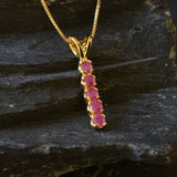 Elegant Natural Ruby Pendant in 18k Gold Vermeil, showcasing a vibrant red ruby, a timeless gift for any celebration.