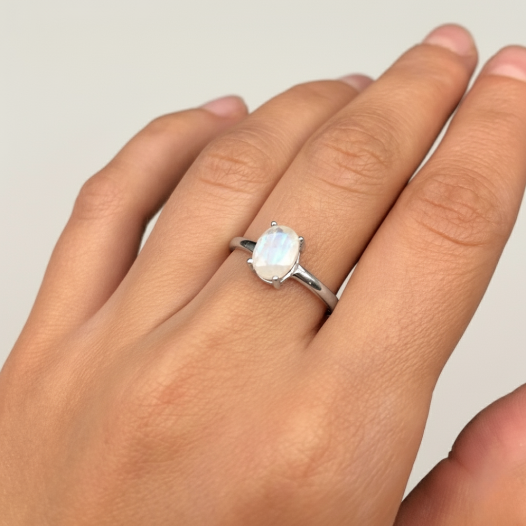 Elegant 925 Sterling Silver ring featuring a stunning oval Rainbow Moonstone, symbolizing healing and perfect for special occasions.