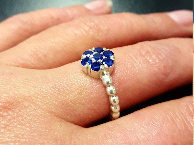 Elegant 925 Sterling Silver Ring featuring a Round Blue Sapphire, ideal for birthdays and special occasions, symbolizes loyalty.