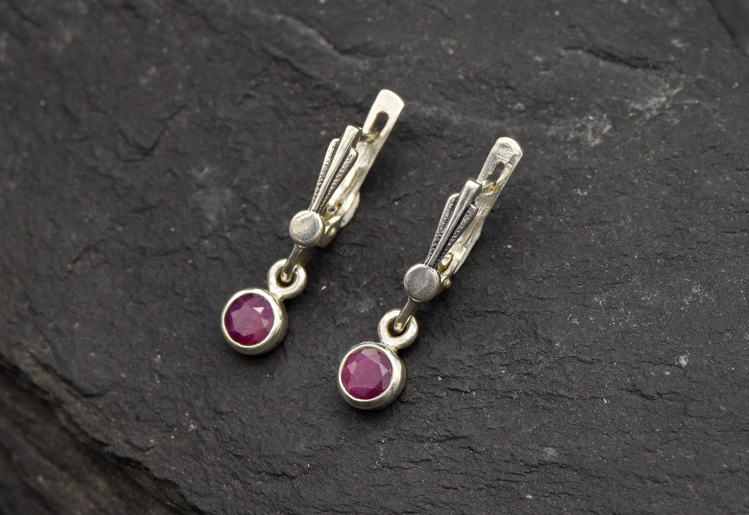 Natural Ruby Earrings made in 925 Sterling Silver with Round Natural Red Ruby in Bezel setting, July Birthstone gift idea, symbolizes nobility, purity, and passion, ideal for everyday wear and perfect for birthday gifting and special occasions.