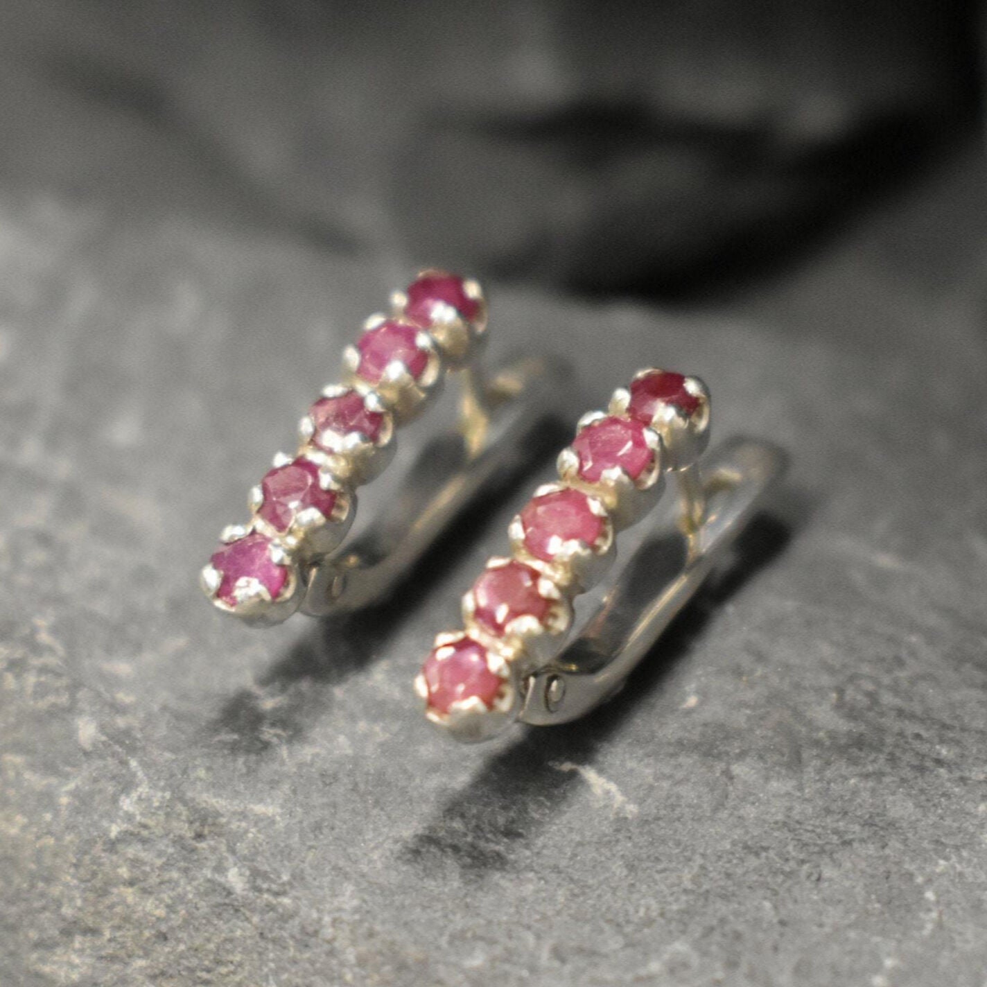 Natural Ruby Earrings made in 925 Sterling Silver with Round Natural Red Ruby in Channel-Set setting, July Birthstone gift idea, symbolizes nobility, purity, and passion, ideal for everyday wear and perfect for birthday gifting and special occasions.
