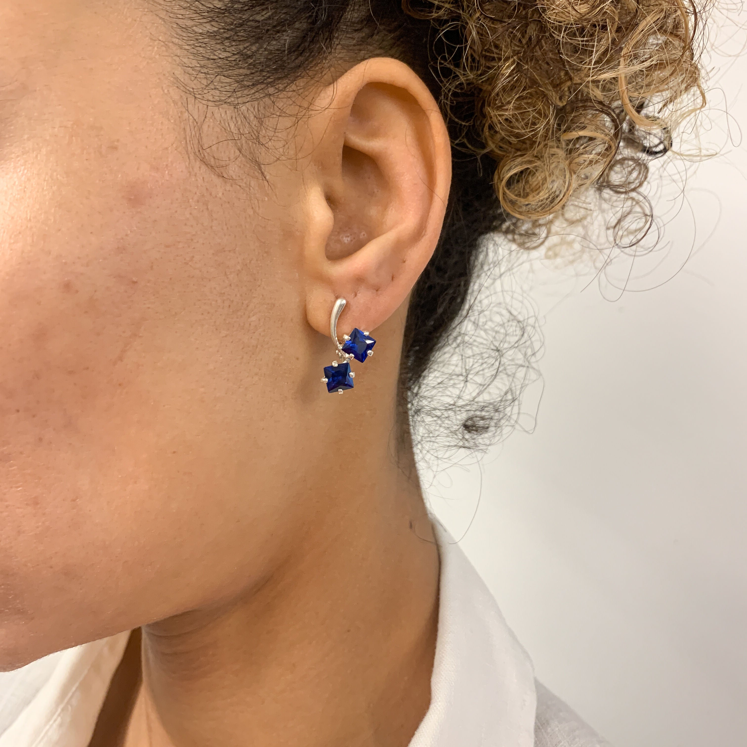 Sapphire earrings in 925 Sterling Silver, featuring a square blue sapphire, perfect for September birthdays and special occasions.