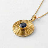 Delicate 18k gold-vermeil coin necklace with blue spiral sapphire, September birthstone—perfect birthday or everyday gift