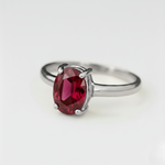 Chic 925 Sterling Silver ring set with an Oval Created Red Ruby, a vibrant July birthstone perfect for any celebration.