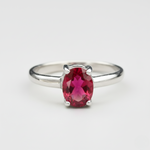 Stunning 925 Sterling Silver ring featuring an Oval Created Red Ruby, a meaningful July birthstone for cherished moments.