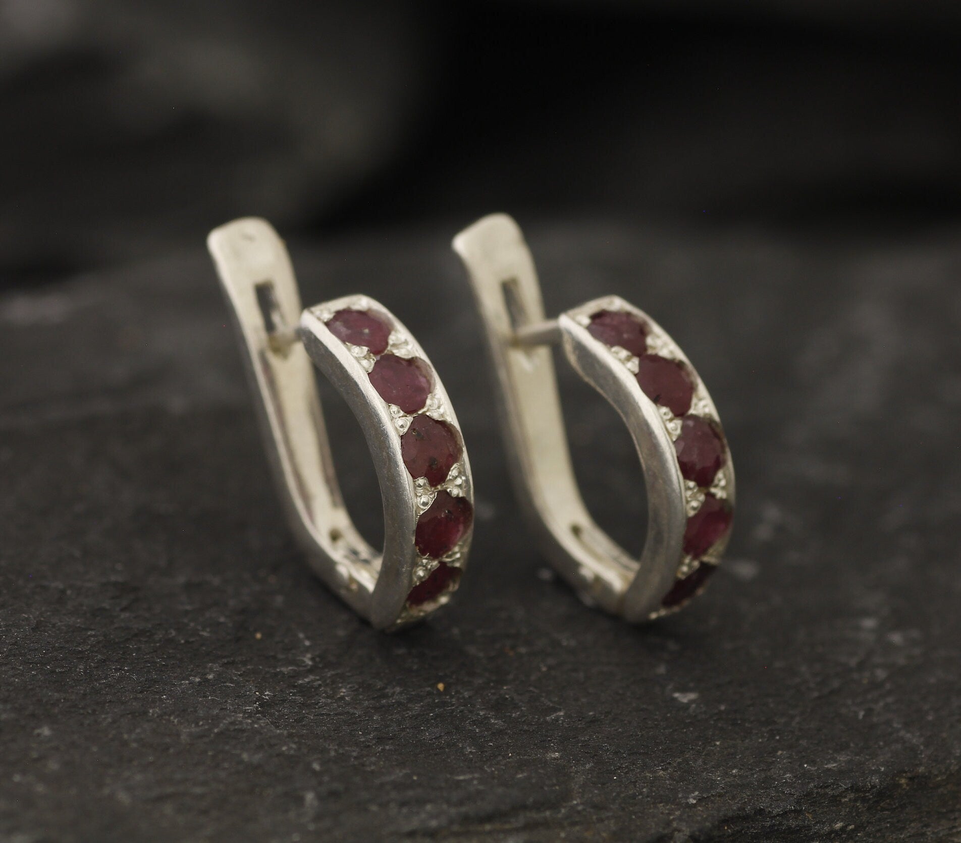 Natural Ruby Earrings made in 925 Sterling Silver with Round Natural Red Ruby in Channel-Set setting, July Birthstone gift idea, symbolizes nobility, purity, and passion, ideal for everyday wear and perfect for birthday gifting and special occasions.