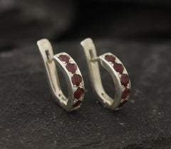 Natural Ruby Earrings made in 925 Sterling Silver with Round Natural Red Ruby in Channel-Set setting, July Birthstone gift idea, symbolizes nobility, purity, and passion, ideal for everyday wear and perfect for birthday gifting and special occasions.