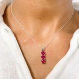 Created Ruby Pendant in 925 Sterling Silver with Three-Stone setting, perfect July birthstone gift for special occasions.